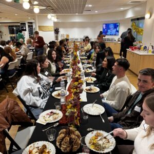 Young adults celebrating Friendsgiving together at Victory Church